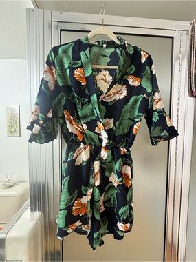 Tropical Floral Black Romper with Green Leaves